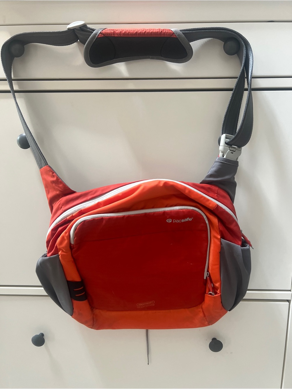 Pacsafe Red and Orange Crossbody Messenger Sling